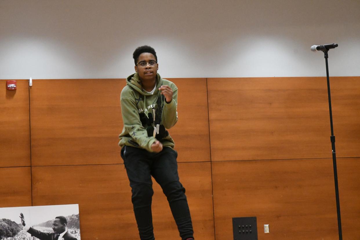 Local middle school student CJ Black performs a dance at the 23rd annual MLK Unity Breakfast on Martin Luther King Day at Blue Ridge Community College.