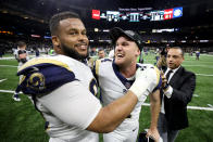 <p>Aaron Donald #93 and Greg Zuerlein #4 of the Los Angeles Rams celebrate after defeating the New Orleans Saints in the NFC Championship game at the Mercedes-Benz Superdome on January 20, 2019 in New Orleans, Louisiana. The Los Angeles Rams defeated the New Orleans Saints with a score of 26 to 23. (Photo by Streeter Lecka/Getty Images) </p>