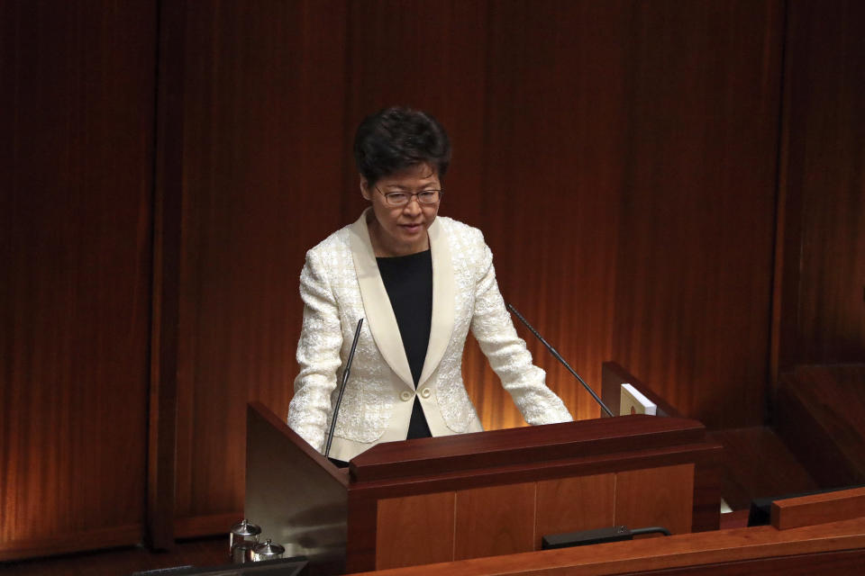 Hong Kong Chief Executive Carrie Lam speaks as she attends a question and answer session with lawmakers at the chamber of the Legislative Council in Hong Kong, Thursday, Oct. 17, 2019. (AP Photo/Mark Schiefelbein)