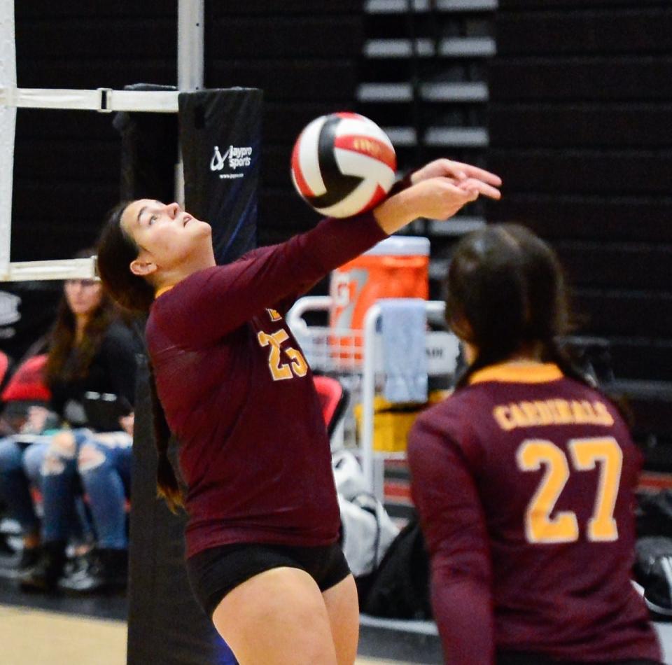 Joseph Case's Olivia Silva pushes a ball over the net during a recent match against Durfee.