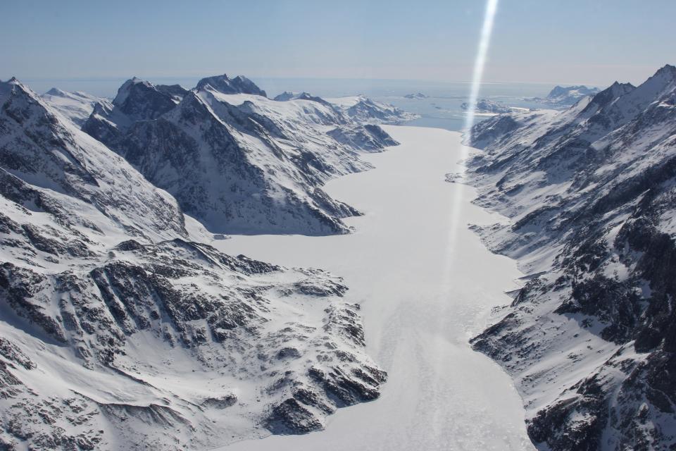 A fjord in southeast Greenland is covered in fast ice, or sea ice connected to the coast, for about four months a year, from February to late May. In April 2016, open water confined polar bears to a small region along the coast. A study by Kristin Laidre from the University of Washington and a group of collaborators through the Greenland Institute for Natural Resources says these animals should be considered the world's 20th population of polar bears.