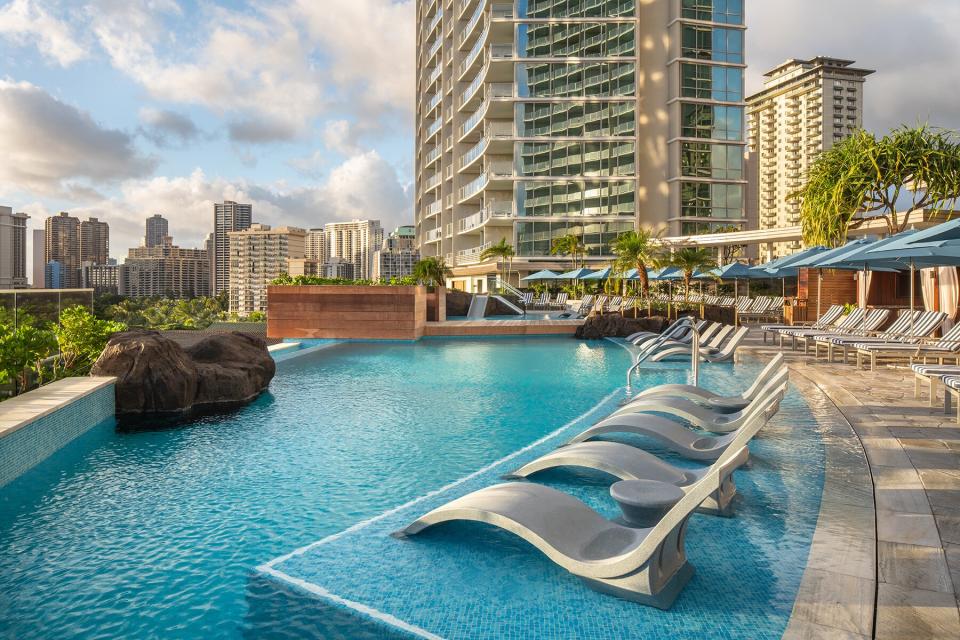 The pool deck at The Ritz-Carlton Residences, Waikiki Beach