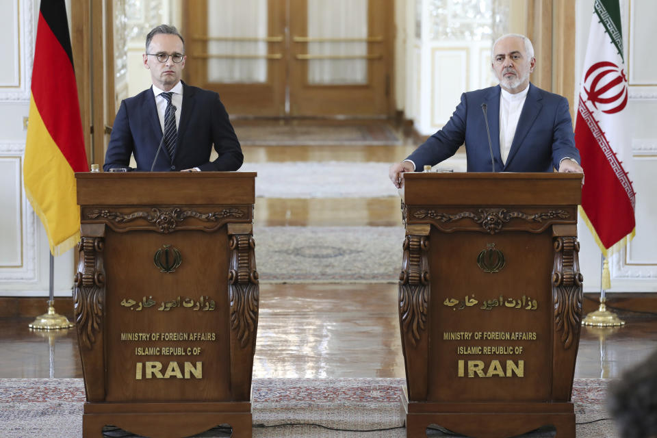 Iranian Foreign Minister Mohammad Javad Zarif, right, and his German counterpart Heiko Maas give a press conference after their talks, in Tehran, Iran, Monday, June 10, 2019. Zarif warned the U.S. on Monday that it "cannot expect to stay safe" after launching what he described as an economic war against Tehran, taking a hard-line stance amid a visit by Germany's top diplomat seeking to defuse tensions. (AP Photo/Ebrahim Noroozi)