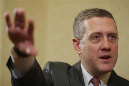 James Bullard, President of the St. Louis Federal Reserve Bank, speaks during an interview with Reuters in Boston, Massachusetts August 2, 2013. REUTERS/Brian Snyder