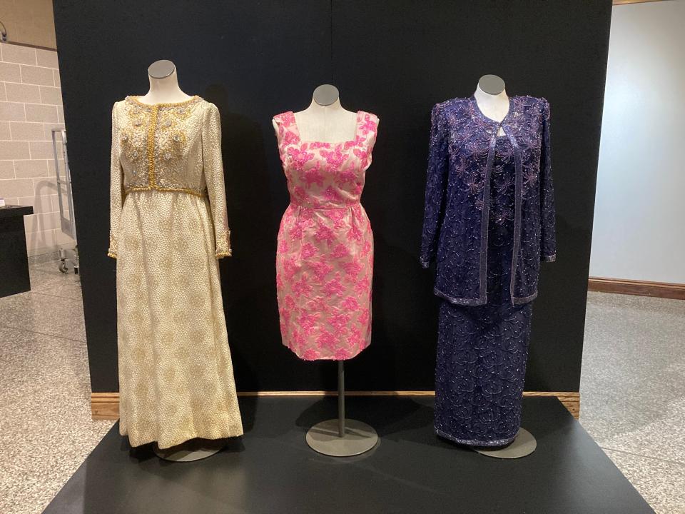 Formal dresses are part of the new Keller Gallery exhibition, "A Constellation of Objects." Display organizers paired items with constellations in the night sky.