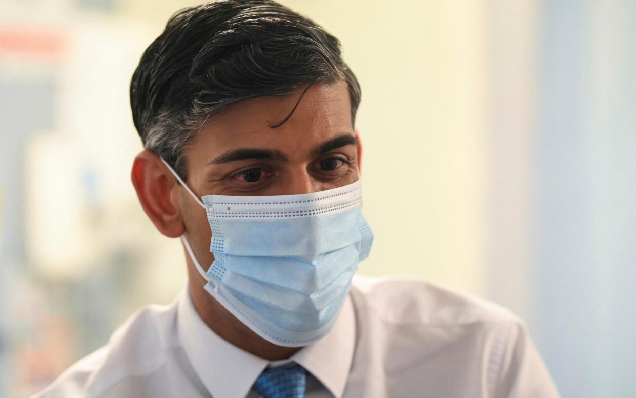 Rishi Sunak, the Prime Minister, is pictured yesterday during a visit to St George's Hospital in London - Toby Meville /Reuters