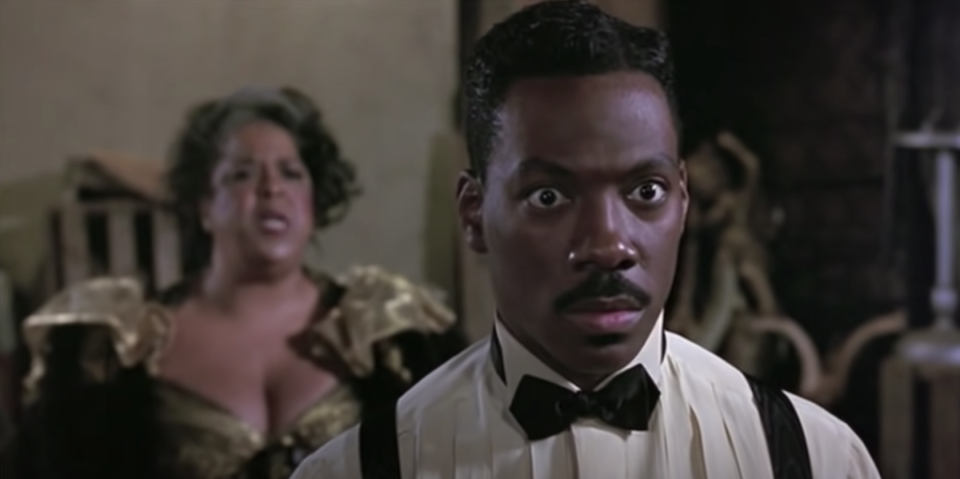 Eddie Murphy in shock with Della Reese behind him