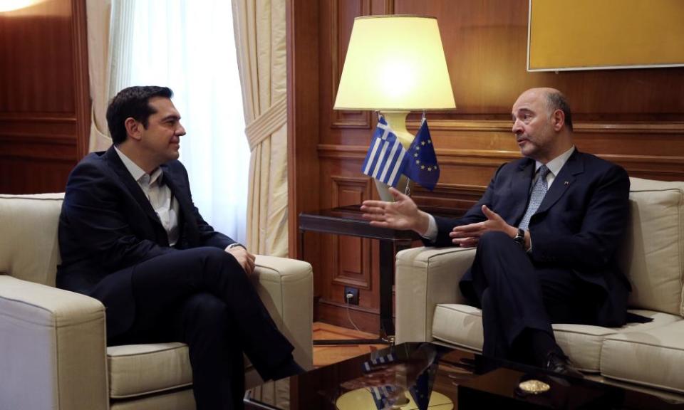 Greek prime minister Alexis Tsipras meets with European economic affairs commissioner Pierre Moscovici in Athens last week. 