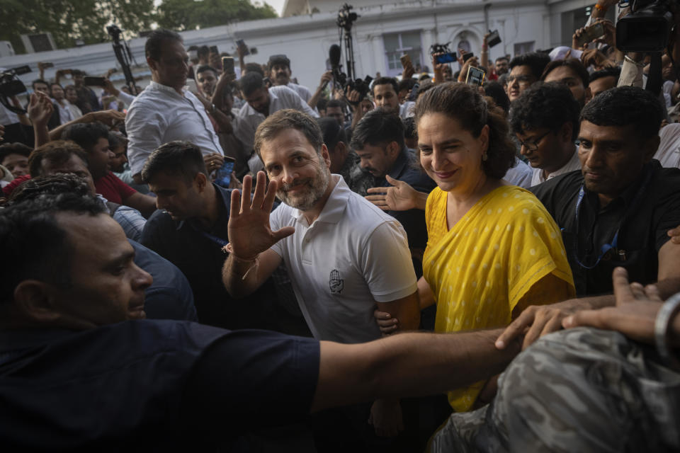 Congress Party leader Rahul Gandhi, center, leaves the party headquarters with his sister and party leader Priyanka Gandhi Vadra after addressing a press conference in New Delhi, India, Tuesday, June 4, 2024. (AP Photo/Altaf Qadri)