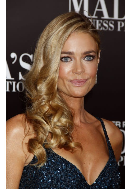 Denise Richards arrives for "Tyler Perry's Madea's Witness Protection" premiere at the AMC Lincoln Square Theater in New York in 2012. File Photo by Laura Cavanaugh/UPI
