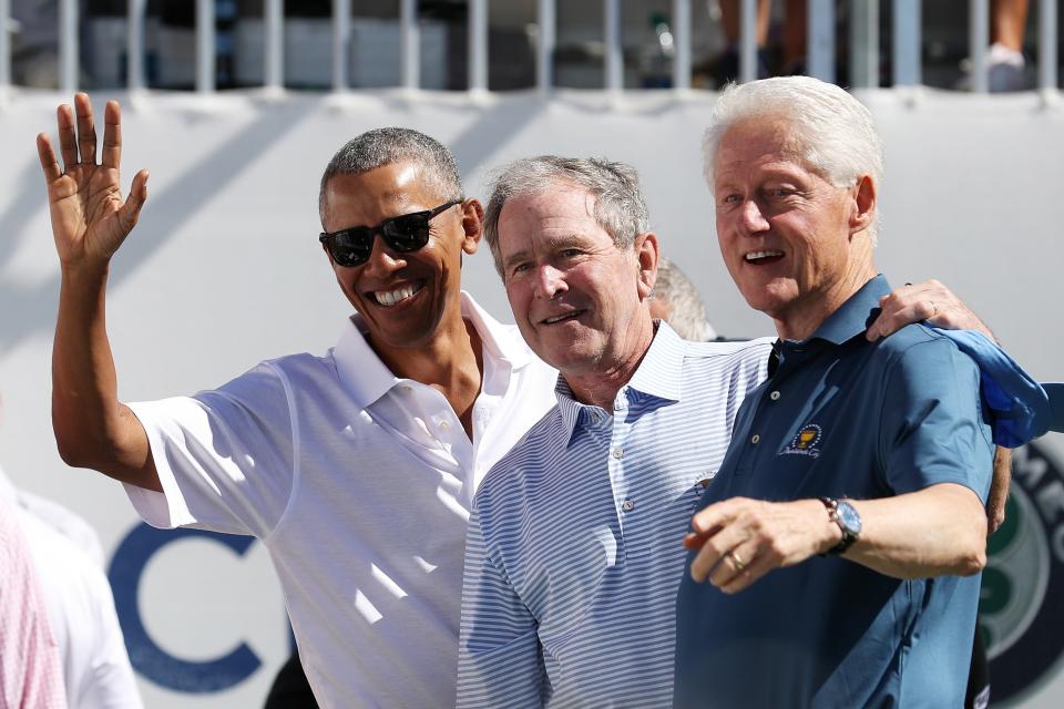 Former U.S. Presidents Barack Obama, George W. Bush and Bill Clinton attend the trophy presentation of the Presidents Cup at Liberty National Golf Club on September 28, 2017 Getty Images