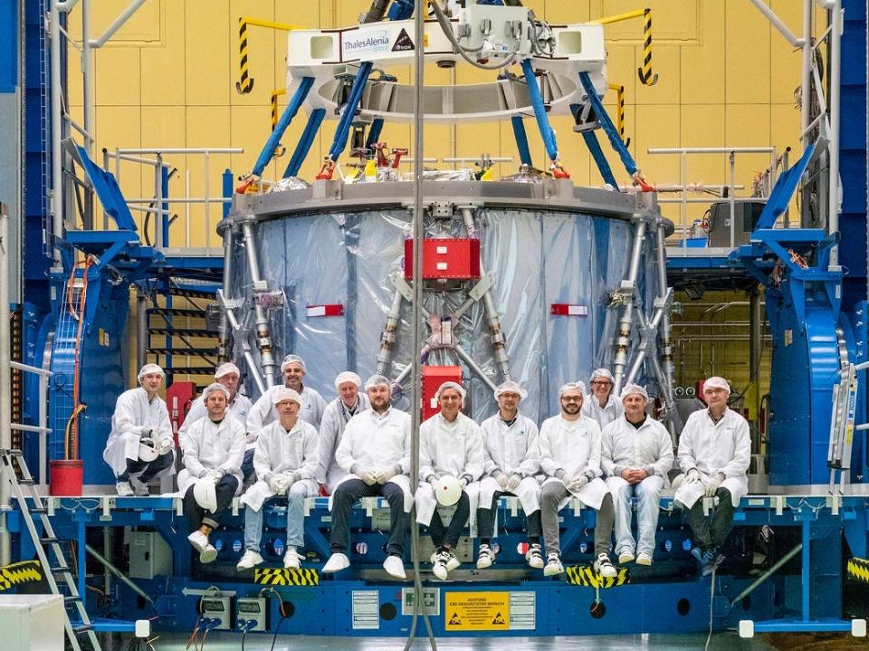 Engineers pose with the European Service Module during preparations for shipment to NASA's Kennedy Space Center on November 6, 2018.