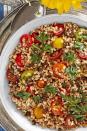 <p>Use a mix of grape and cherry tomatoes to make this bright and beautiful bowl. With veggies that look this good, no one will be able to resist.</p><p><strong><a href="https://www.countryliving.com/food-drinks/a22665680/farro-and-tomato-salad-with-crispy-capers-recipe/" rel="nofollow noopener" target="_blank" data-ylk="slk:Get the recipe for Farro-and-Tomato Salad with Crispy Capers;elm:context_link;itc:0;sec:content-canvas" class="link ">Get the recipe for Farro-and-Tomato Salad with Crispy Capers</a>.</strong> </p>