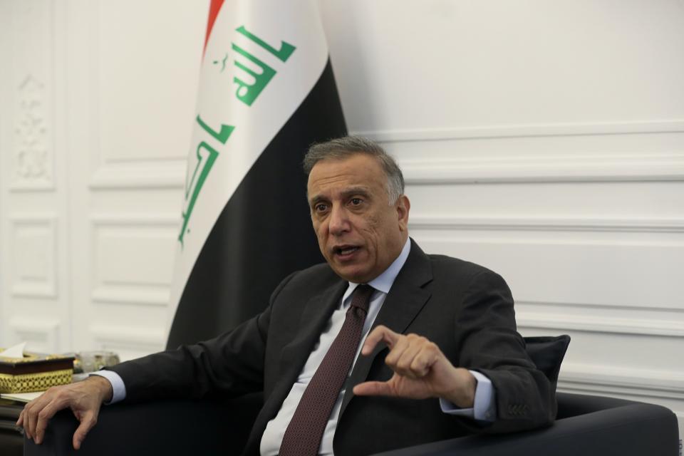 Iraqi Prime Minister Mustafa al-Kadhimi speaks during an interview with The Associated Press in Baghdad, Iraq, Monday, Aug. 17, 2020. (AP Photo/Khalid Mohammed)