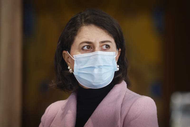 NSW Premier Gladys Berejiklian looks on during a press conference in Sydney.