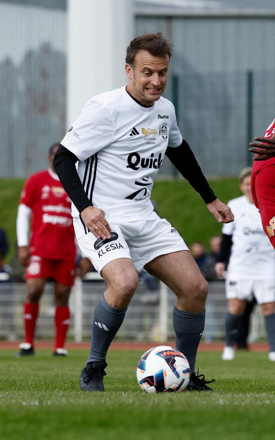 Macron playing football