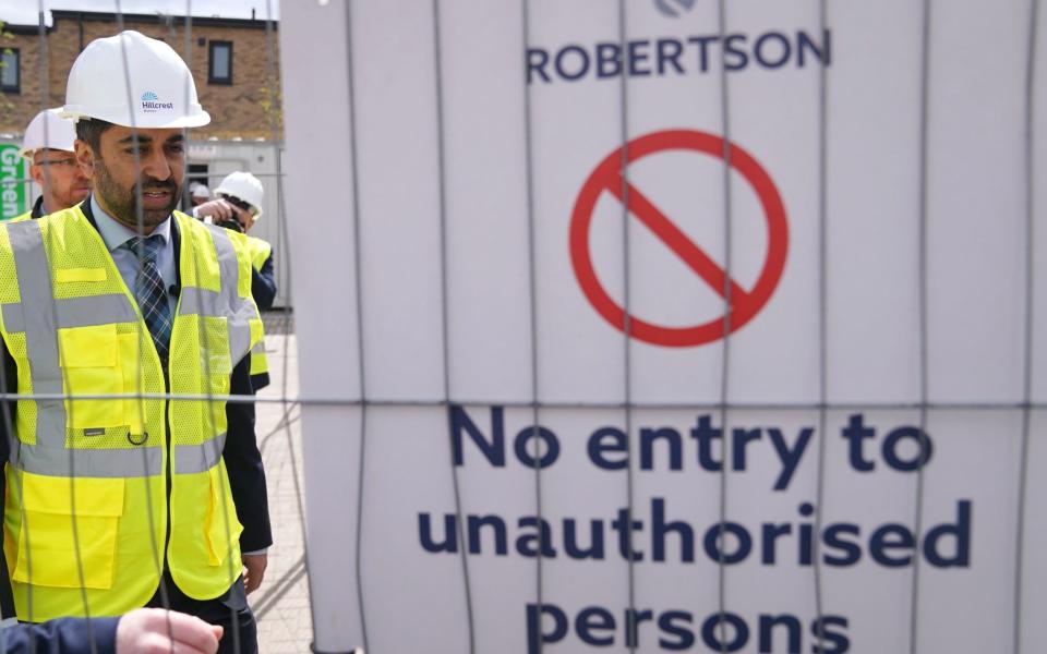 Humza Yousaf, the First Minister of Scotland, visits a housing development in Dundee