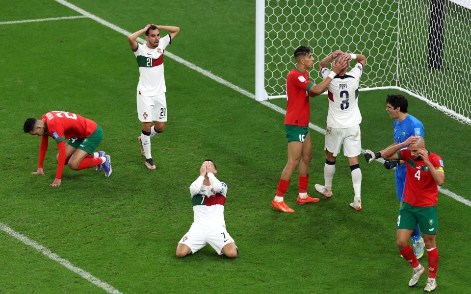 Cristiano Ronaldo of Portugal reacts with teammates after a missed chance - GETTY IMAGES