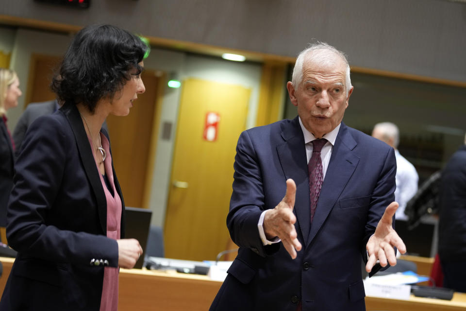 European Union foreign policy chief Josep Borrell, right, speaks with Belgium's Foreign Minister Hadja Lahbib during a meeting of EU foreign ministers at the European Council building in Brussels, Monday, Jan. 22, 2024. European Union Foreign Affairs Ministers meet in Brussels on Monday to discuss the situation in the Middle East and in Ukraine. (AP Photo/Virginia Mayo)