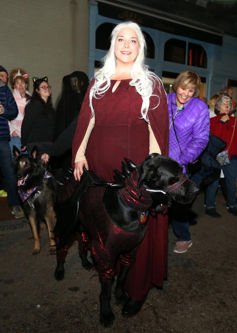 Locals attend the annual Halloween Parade in Market Square in Portsmouth on Monday, October 31, 2022.