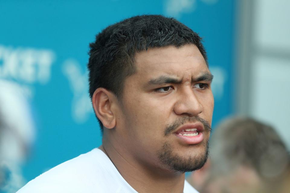 Detroit Lions offensive tackle Penei Sewell (58) talks with reporters after training camp at team headquarters in Allen Park on Friday, July 28, 2023.