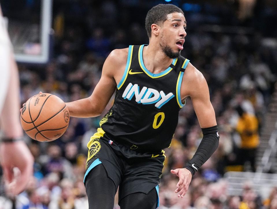 Indiana Pacers guard Tyrese Haliburton (0) rushes up the court Saturday, Dec. 30, 2023, during the game at Gainbridge Fieldhouse in Indianapolis. The Indiana Pacers defeated the New York Knicks, 140-126.