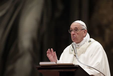 Pope Francis speaks during the Easter vigil mass in Saint Peter's basilica at the Vatican, April 15, 2017. REUTERS/Max Rossi