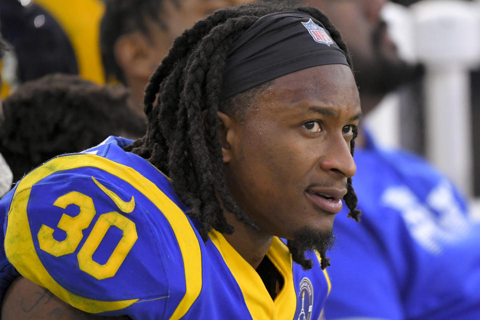 Todd Gurley looks on from the bench.