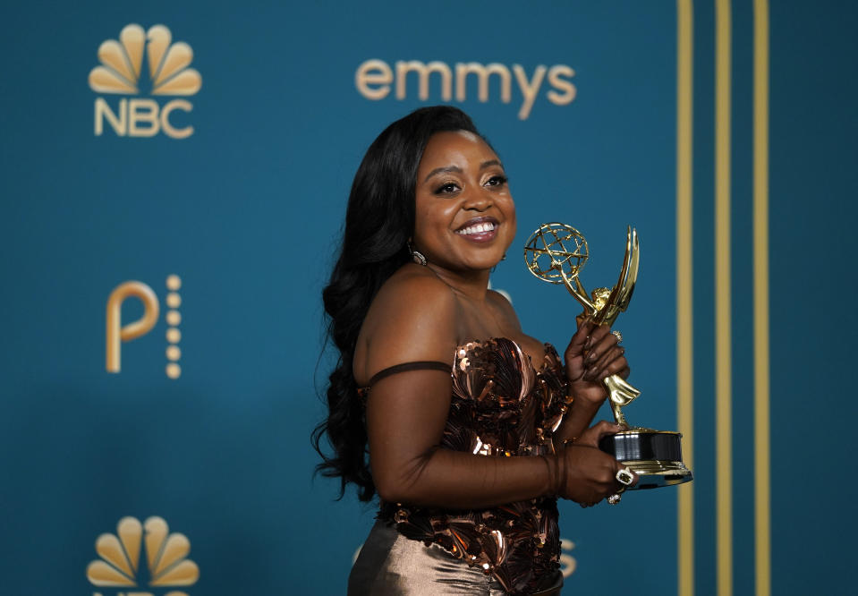 Quinta Brunson, winner of the Emmy for outstanding writing for a comedy series for "Abbott Elementary," poses in the press room at the 74th Primetime Emmy Awards on Monday, Sept. 12, 2022, at the Microsoft Theater in Los Angeles. (AP Photo/Jae C. Hong)