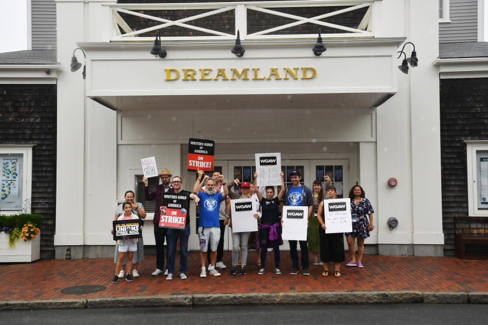 Writers Guild of America writer and supporters rally at the Dreamland Theater for the WGA strike