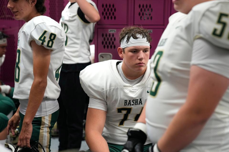 Basha tackle Jake Hildebrand waits in the locker room for the game to start against Hamilton during a game at Hamilton High School in Chandler on Oct. 6, 2023.