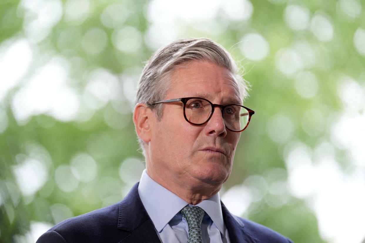 FILE PHOTO: British Prime Minister Keir Starmer looks on as he speaks to the media outside the Arden Academy in Solihull, West Midlands, Britain August 8, 2024.   Joe Giddens/Pool via REUTERS/File Photo