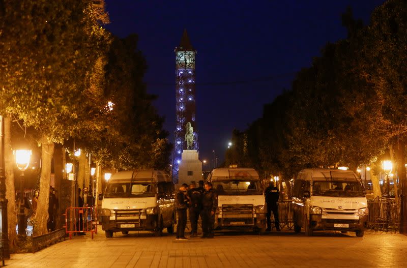 A police officer stands guard near the interior ministry in Tunis