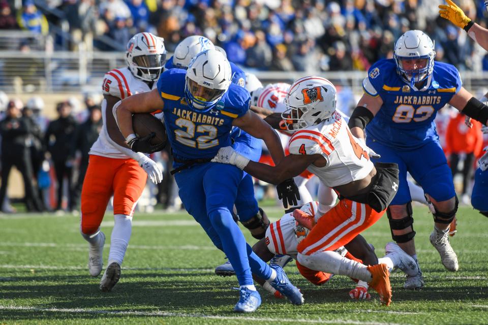 SDSU's running back Isaiah Davis runs with the ball during a game against Mercer University on Saturday, Dec. 2, 2023 at Dana J Dykhouse Stadium in Brookings.