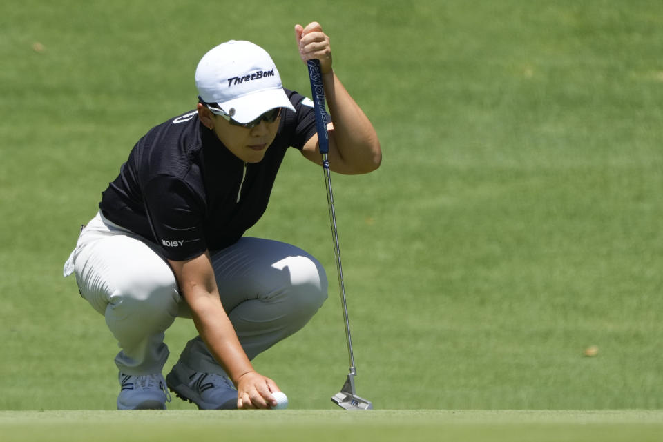 Jiyai Shin of South Korea lines up a putt on the first green during the second round of the Australian Open Golf Championship in Sydney, Australia, Friday, Dec. 1, 2023. (AP Photo/Mark Baker)