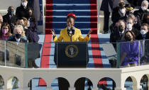 National youth poet laureate Amanda Gorman recites her inaugural poem during the 59th Presidential Inauguration at the U.S. Capitol in Washington, Wednesday, Jan. 20, 2021. Joe Biden became the 46th president of the United States on Wednesday. (AP Photo/Patrick Semansky, Pool)