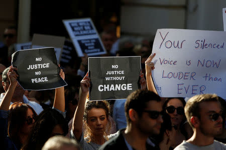 People protest against the assassination of investigative journalist Daphne Caruana Galizia last Monday, in Valletta, Malta, October 22, 2017. REUTERS/Darrin Zammit Lupi