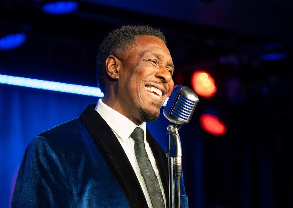 John-Mark McGaha sings the music of Nat King Cole in "Unforgettable," staged by Milwaukee Repertory Theater.