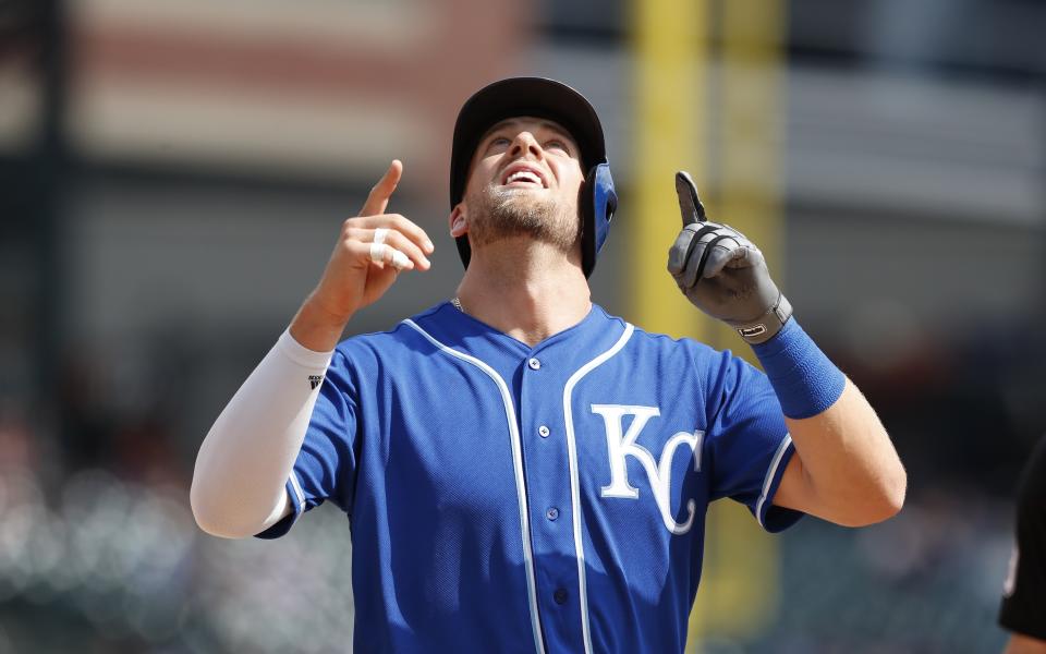 Kansas City Royals' Hunter Dozier looks skyward after hitting a two-run home run during the seventh inning of a baseball game against the Detroit Tigers, Saturday, April 6, 2019, in Detroit. (AP Photo/Carlos Osorio)