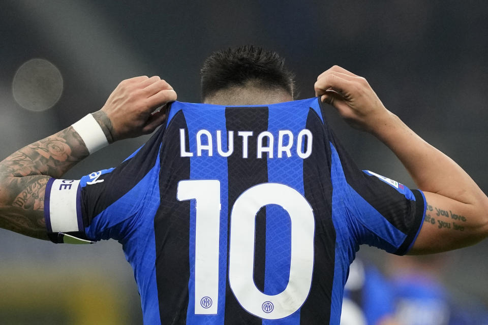 Inter Milan's Lautaro Martinez celebrates after scoring his side's opening goal during the Serie A soccer match between Inter Milan and AC Milan at the San Siro Stadium, in Milan, Italy, Sunday, Feb. 5, 2023. (AP Photo/Antonio Calanni)