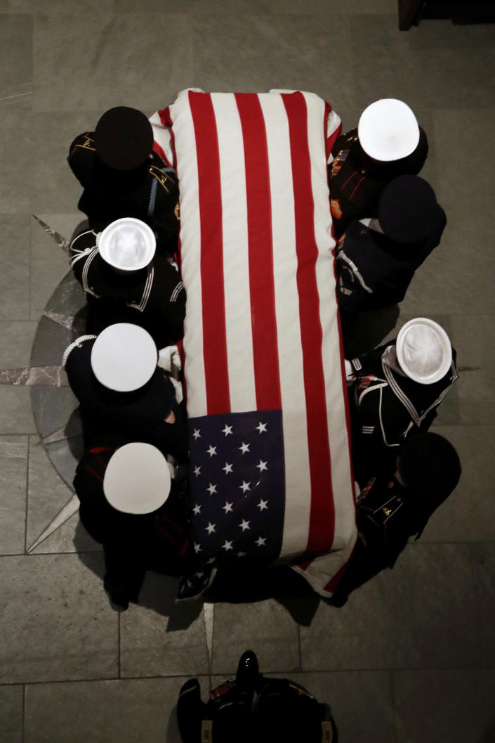 The flag-draped casket of former President George H.W. Bush is carried by a joint services military honor guard at St. Martin’s Episcopal Church Wednesday, Dec. 5, 2018, in Houston. (Photo: Mark Humphrey/AP)