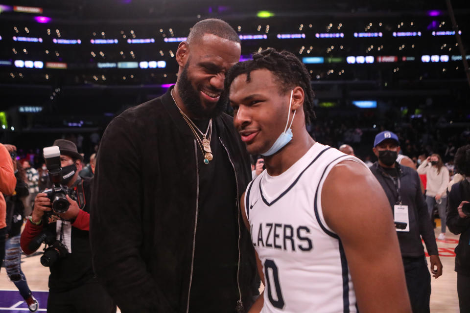 LeBron James congratulating his son Bronny James after his team won The Chosen - 1's Invitational High School Basketball Showcase in 2021. 