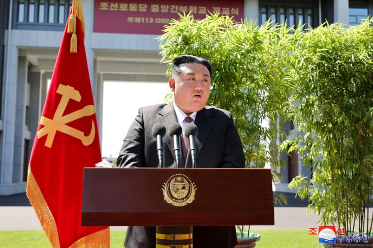 A photo released by North Korea's official Korean Central News Agency shows Kim Jong Un speaking in Pyongyang (STR)