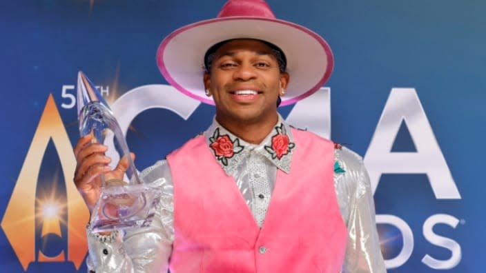 Jimmie Allen poses with his New Artist of the Year trophy at the 55th annual Country Music Association Awards in Nashville. (Photo: Jason Kempin/Getty Images)