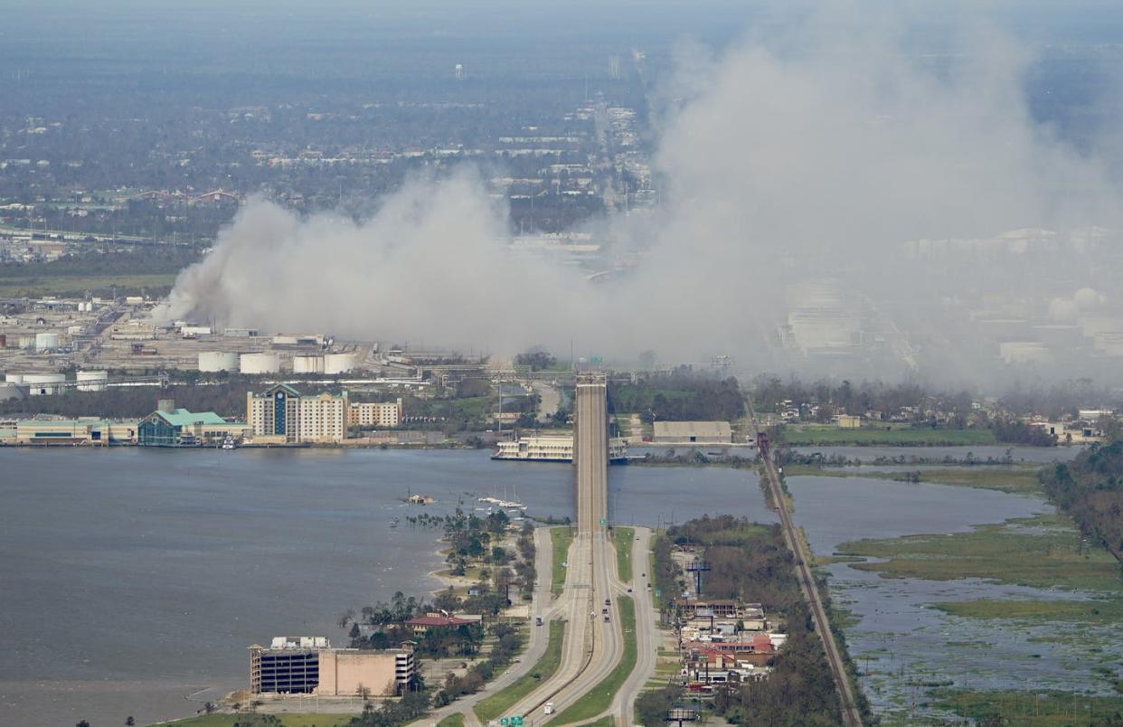 <span class="caption">Smoke billowed from the fire at a chlorine plant in Westlake, Louisiana, after Hurricane Laura moved through on Aug. 27. </span> <span class="attribution"><a class="link " href="http://www.apimages.com/metadata/Index/Tropical-Weather-Louisiana/5de715f074584e6181260928c0445435/5/0" rel="nofollow noopener" target="_blank" data-ylk="slk:AP Photo/David J. Phillip;elm:context_link;itc:0;sec:content-canvas">AP Photo/David J. Phillip</a></span>