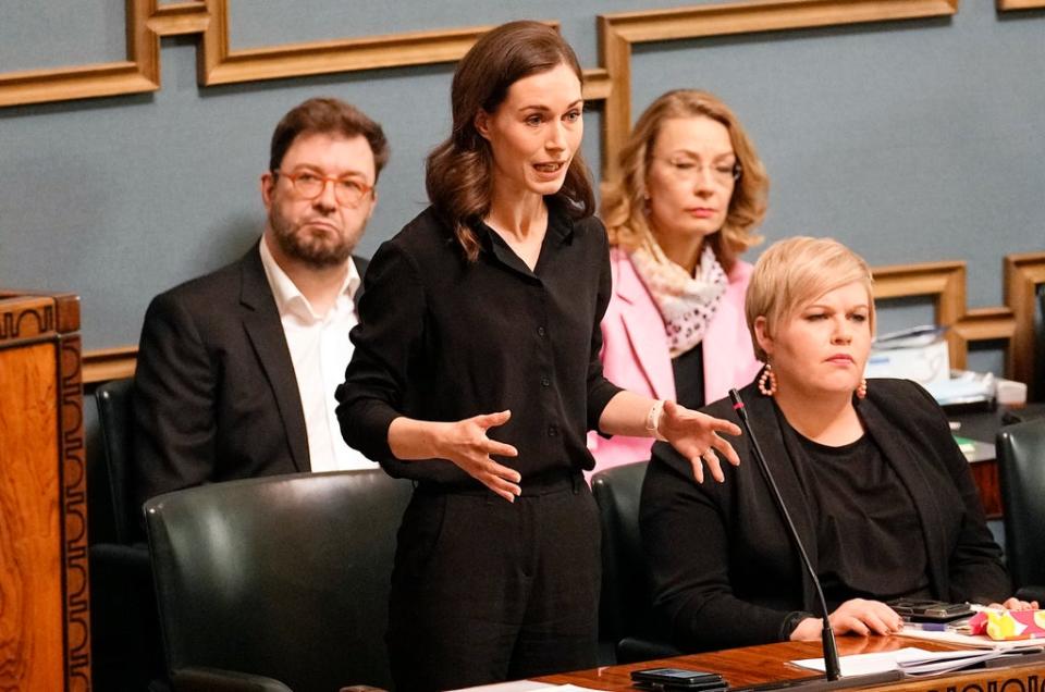 Prime minister of Finland Sanna Marin talks at the Finnish Parliament in Helsinki on 16 May (AP)