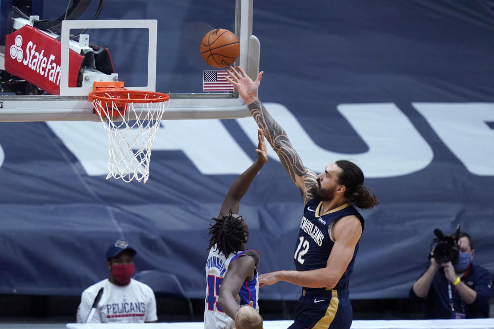 New Orleans Pelicans center Steven Adams (12) goes to the basket against Detroit Pistons forward Sekou Doumbouya (45) during the first half of an NBA basketball game in New Orleans, Wednesday, Feb. 24, 2021. (AP Photo/Gerald Herbert)