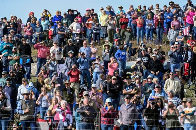 Spectators watch from the southern viewing point during the 58th annual Custer Buffalo Roundup on Friday morning.
