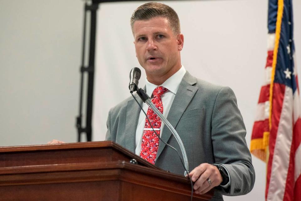 Kodie Koenenn, a candidate for chancery clerk in Hancock County, speaks during an election forum in Waveland on Monday, July 10, 2023.