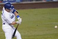 Los Angeles Dodgers' Will Smith hits a home run during the fifth inning of the team's baseball game against the Los Angeles Angels on Friday, Sept. 25, 2020, in Los Angeles. (AP Photo/Ashley Landis)